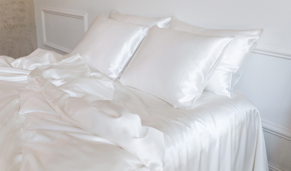 synthetic satin vs genuine silk sheets